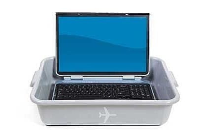 Laptop in a gray plastic bin; safe travel for metal business cards?