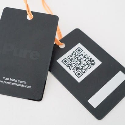 Black metal hang tags with "Pure" logo and QR code. Pure Metal Cards website address included.