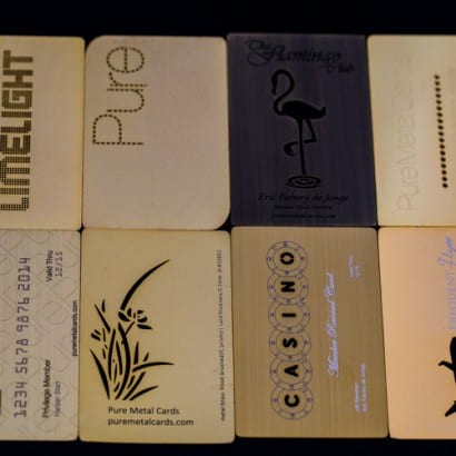 Collection of gold metal cards featuring various designs and logos. These gold cards set the gold standard.