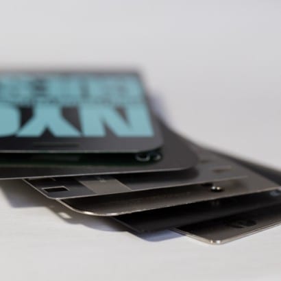 Close-up of various metal cards showcasing different metal card thicknesses. NYC.