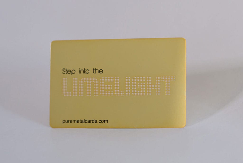 Gold mirror card with "Step into the Limelight" in perforated lettering. Puremetalcards.com
