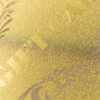 pure-metal-cards-brass-gold-frosted-card-close-up-1 Close-up of elegant brass (gold) frosted card with embossed lettering.