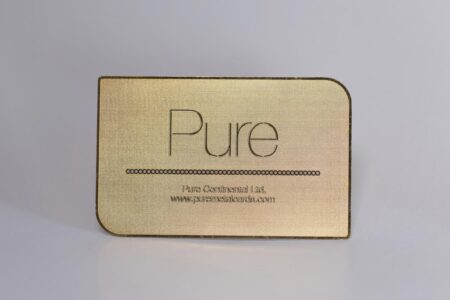 Gold brass prism business card with "Pure" engraved. www.puremetalcards.com