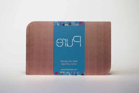 Rose gold copper prism card with "Pure" logo and member details.