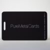 Matt black frosted stainless steel card with "Pure Metal Cards" logo.