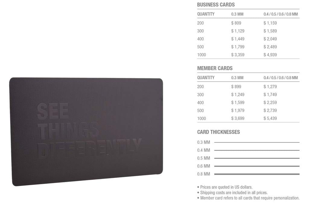 Matt black prism stainless steel business cards with "See Things Differently" embossed.