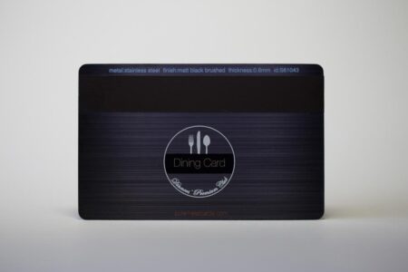 Matt black brushed stainless steel dining card. "Dining Card" text visible.