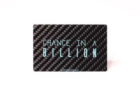 Glossy black carbon fiber business card; "Chance in a Billion