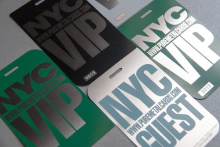 NYC VIP passes and guest passes; metallic, engraved designs.