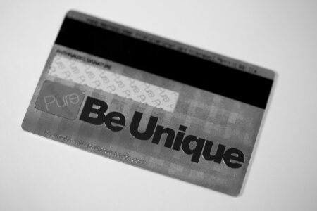Silver metal Be Unique loyalty card