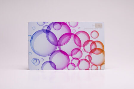 Full color metal business card design featuring a bubble pattern. puremetalcards.com