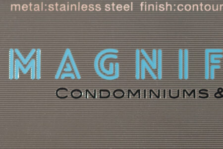 Magnificent Condominiums & silver contour metal cards with stainless steel finish.