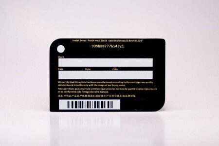Matt black brass card with product details and barcode. 999888777654321