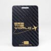 Pure-Metal-Cards-carbon-fiber-luggage-tag-14-1 Black carbon fiber luggage tag with "See the World" and airplane graphic.