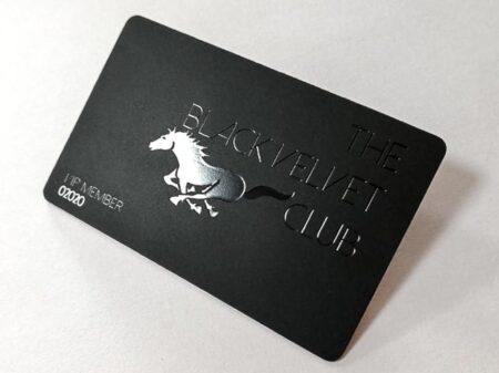 Matt black velvet stainless steel card with silver embossed horse and "The Black Velvet Club" text.