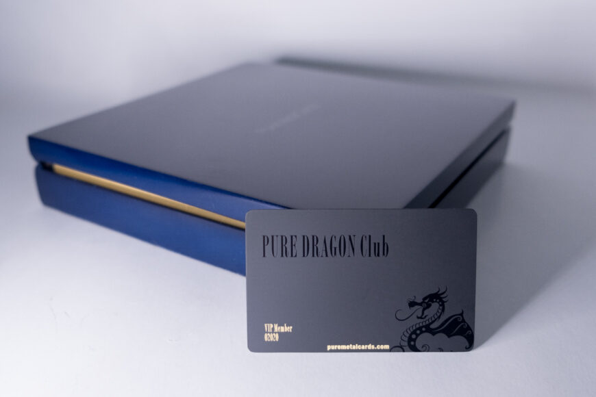 Black velvet metal card in navy blue box. "Pure Dragon Club" is printed on the card.