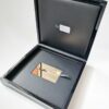 Pure-Metal-Cards-luxury-wood-presentation-case_28 Luxury wood presentation case with gold Frequent Flyer card inside.