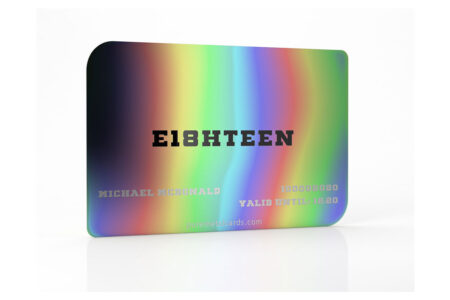 Iridescent steel credit card featuring the word "EIGHTEEN".
