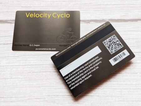 Gunmetal gray metal card featuring "Velocity Cyclo" and member name.