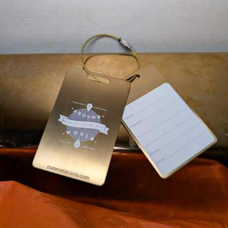 Pure Metal Cards brushed gold titanium metal luggage tags - around the world with gold wire strap