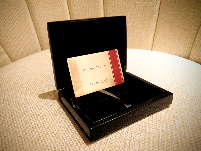 Artisans of Luxury Member Card in a black box. Creative use of metal cards.