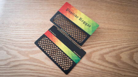 Two metal member cards with QR coupon codes and "Positive Reggae" design.