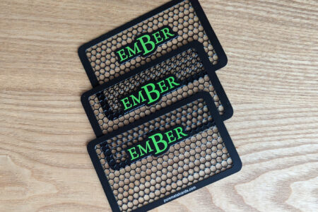Pure Metal Cards - matt black metal grinder cards - ember with wood background