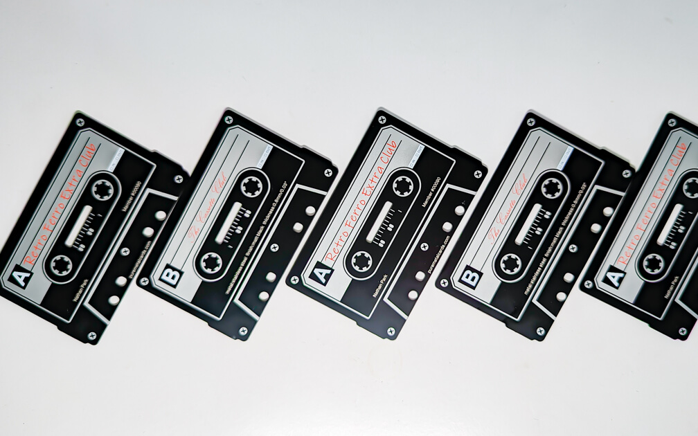 Pure Metal Cards - matt black stainless card in the shape of cassette tapes
