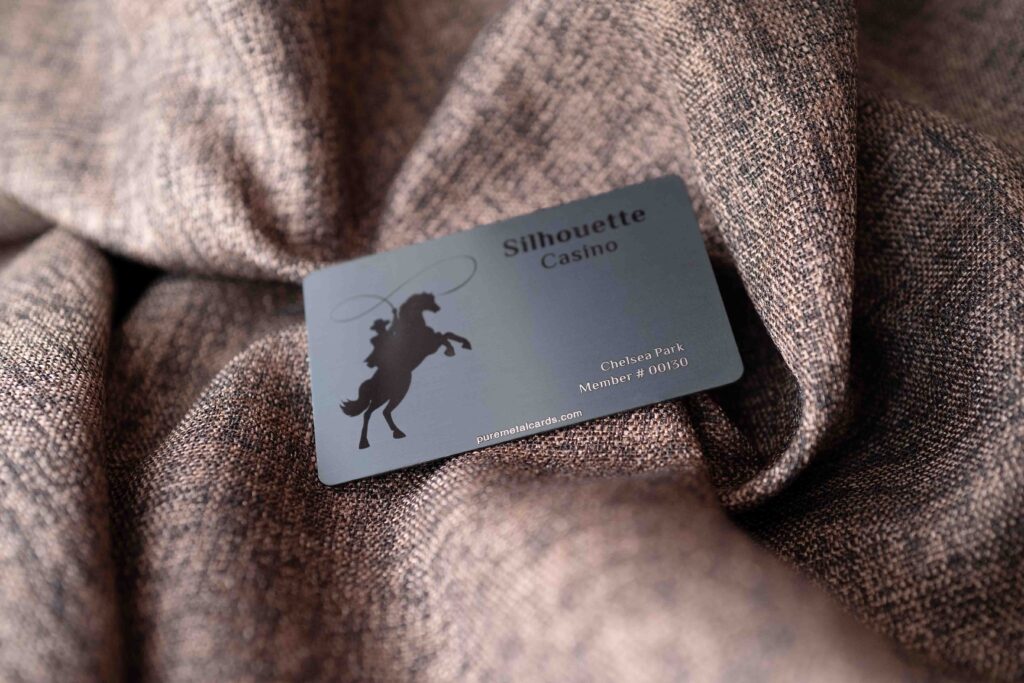 Metal member card for Silhouette Casino featuring a cowboy silhouette by Pure Metal Cards