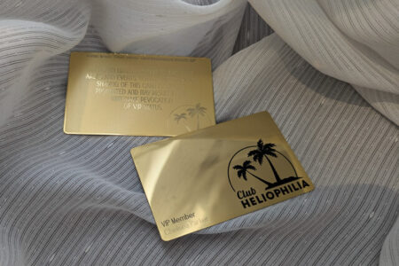 Gold mirror cards with "Club Heliophilia" logo and "VIP Member" text from puremetalcards.com