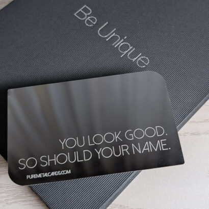 mirror metal business card with "You look good. So should your name." Creative metal card marketing.
