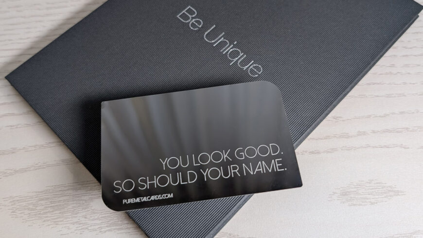 mirror metal business card with "You look good. So should your name." Creative metal card marketing.