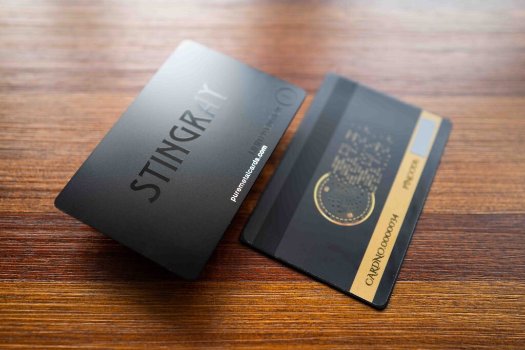 Black metal STINGRAY card with NFC chip designed by Pure Metal Cards, reflecting brand identity.